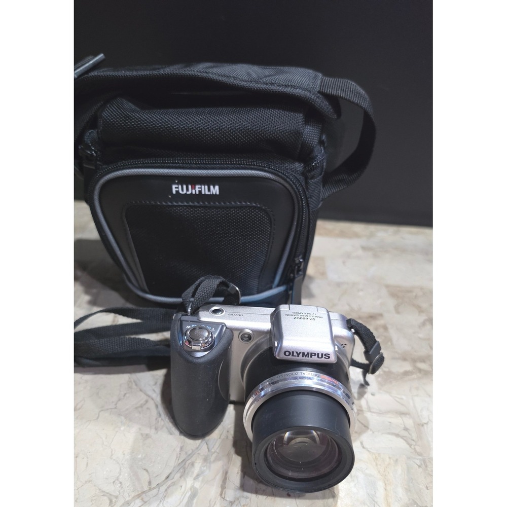 Olympus SP-600UZ 12MP Digital Camera Silver 15x Optical Zoom Bundle SD Case